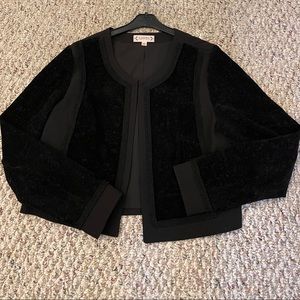 Short open front blazer with mixed material.